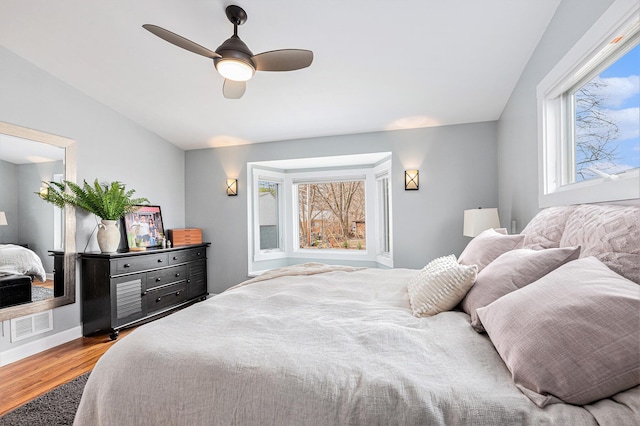 403 N Helen Ave, Rochester, MI 48307 - bedroom with wood finished floors, ceiling fan, and vaulted ceiling