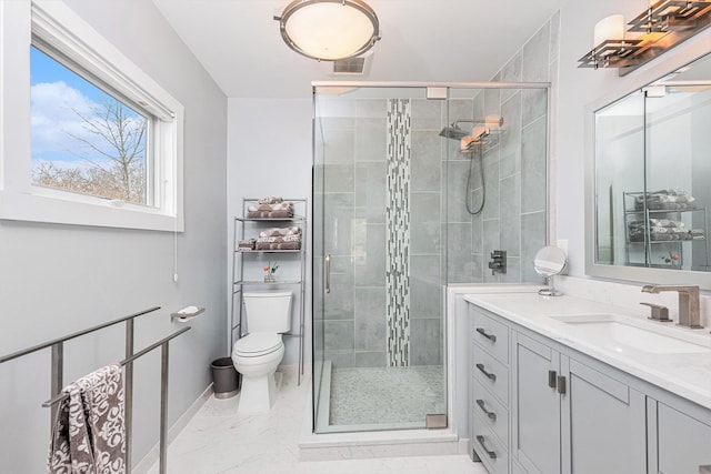 403 N Helen Ave, Rochester, MI 48307 - bathroom featuring toilet, vanity, marble look tile flooring, and a shower stall