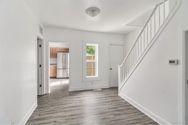 204 E Clinton St, Durand, MI 48429 - entryway with stairway and dark wood-style flooring
