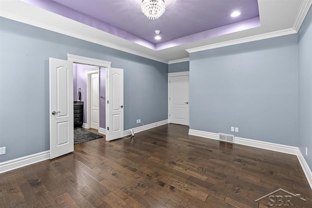 10399 Webster Rd, Freeland, MI 48623 - spare room with a tray ceiling, hardwood / wood-style floors, baseboards, recessed lighting, and crown molding