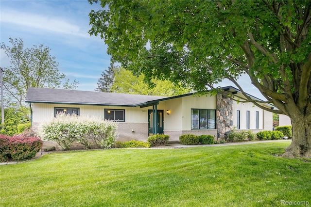 34961 Drake Heights Dr, Farmington, MI 48335 - view of front of house featuring brick siding and a front yard