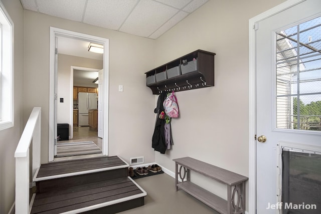 2057 Nickleplate Rd, Ionia, MI 48846 - mudroom featuring a drop ceiling and baseboards