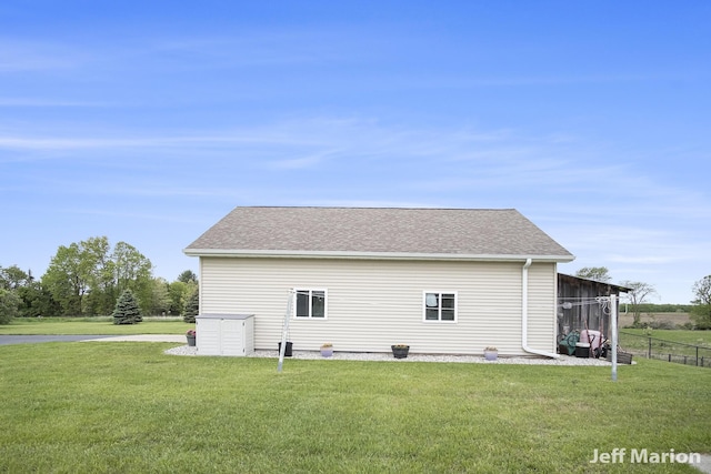 2057 Nickleplate Rd, Ionia, MI 48846 - view of side of home with roof with shingles