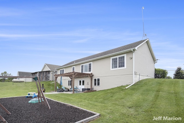 2057 Nickleplate Rd, Ionia, MI 48846 - back of house with outdoor lounge area, a pergola, a lawn, a patio area, and central AC unit