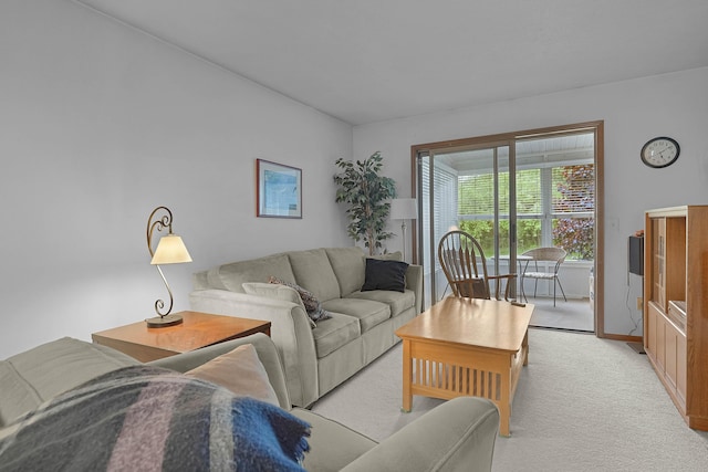 3272 Cambridge St SE, Grand Rapids, MI 49512 - living room featuring light carpet and baseboards
