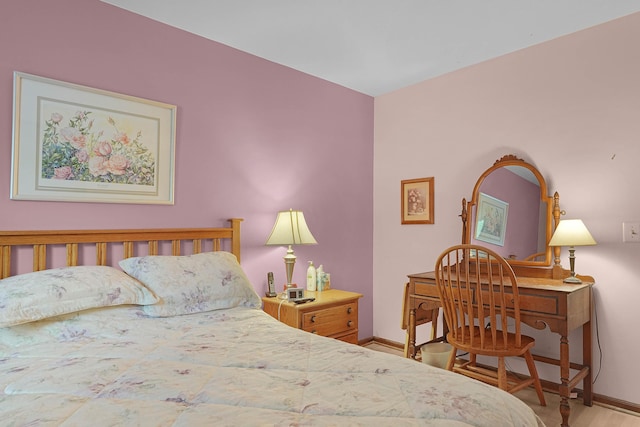 3272 Cambridge St SE, Grand Rapids, MI 49512 - bedroom featuring baseboards and wood finished floors