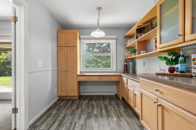 313 W Kilgore Rd, Portage, MI 49002 - kitchen with healthy amount of natural light, dark wood-style floors, open shelves, and glass insert cabinets