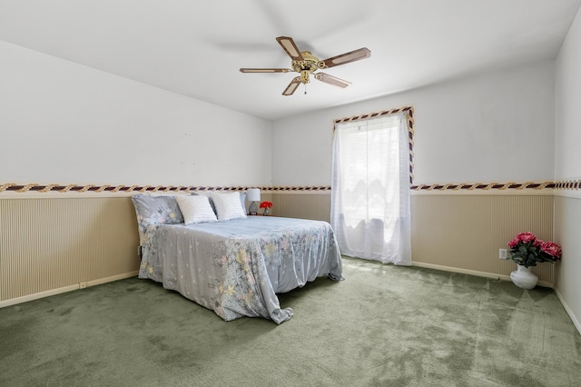 313 W Kilgore Rd, Portage, MI 49002 - bedroom featuring carpet, ceiling fan, baseboards, and a wainscoted wall