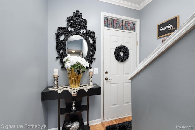 340 N Wixom Rd, Wixom, MI 48393 - entrance foyer featuring ornamental molding and wood finished floors