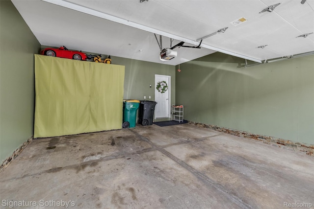 340 N Wixom Rd, Wixom, MI 48393 - garage with a garage door opener