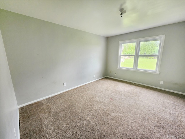 4390 Cass Elizabeth Rd, Waterford, MI 48328 - spare room with carpet flooring and baseboards