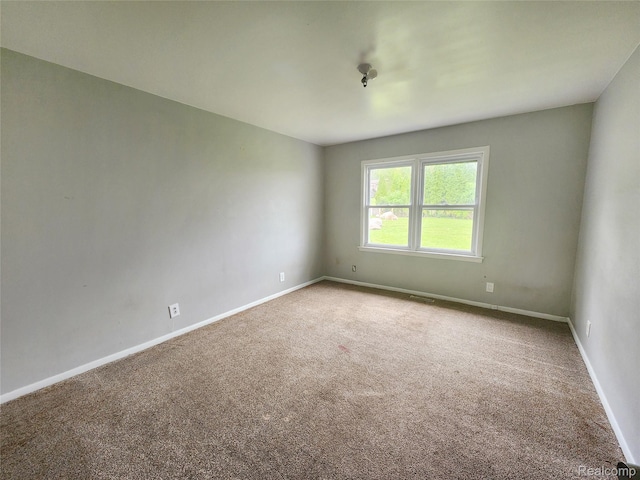 4390 Cass Elizabeth Rd, Waterford, MI 48328 - carpeted spare room featuring baseboards