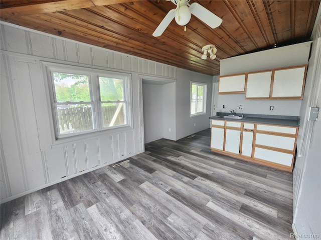 4390 Cass Elizabeth Rd, Waterford, MI 48328 - kitchen with wooden ceiling, dark countertops, wood finished floors, white cabinets, and a ceiling fan