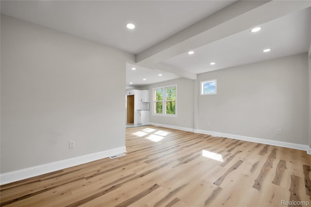 13332 Maiden St, Detroit, MI 48213 - unfurnished room with recessed lighting, baseboards, light wood-style flooring, and beam ceiling
