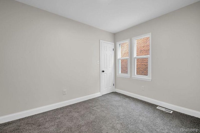 13332 Maiden St, Detroit, MI 48213 - unfurnished room featuring baseboards and dark carpet