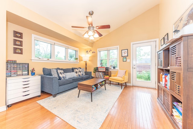 500 Little Lake Dr # 1, Ann Arbor, MI 48103 - living room featuring hardwood / wood-style flooring, vaulted ceiling, and ceiling fan