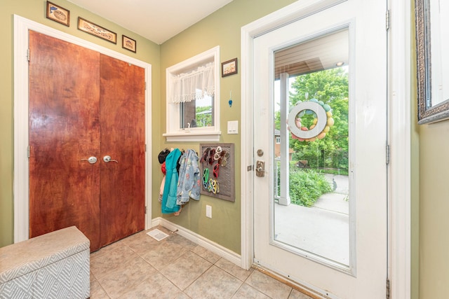 500 Little Lake Dr # 1, Ann Arbor, MI 48103 - entryway with baseboards and light tile patterned floors