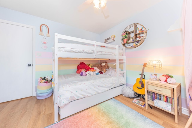 500 Little Lake Dr # 1, Ann Arbor, MI 48103 - bedroom with wood finished floors and ceiling fan