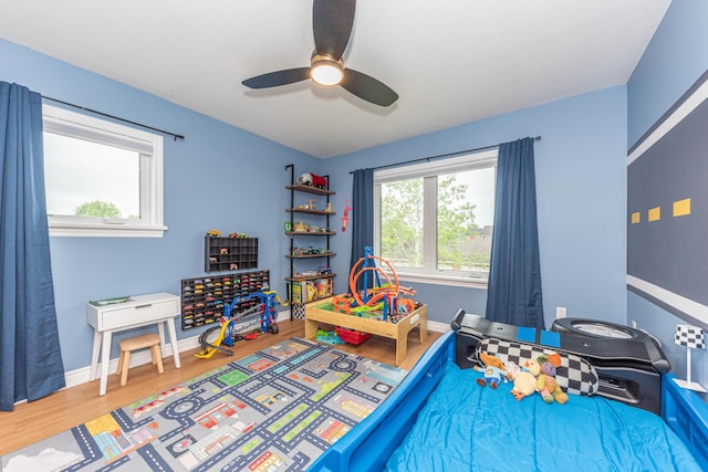 500 Little Lake Dr # 1, Ann Arbor, MI 48103 - rec room with wood finished floors, baseboards, and ceiling fan