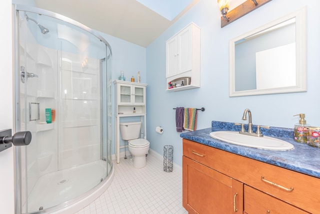 500 Little Lake Dr # 1, Ann Arbor, MI 48103 - full bathroom featuring a stall shower, vanity, toilet, tile patterned flooring, and baseboards