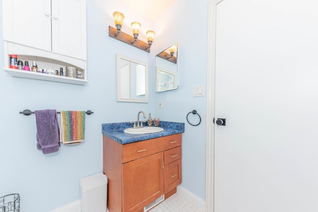 500 Little Lake Dr # 1, Ann Arbor, MI 48103 - bathroom with vanity and baseboards