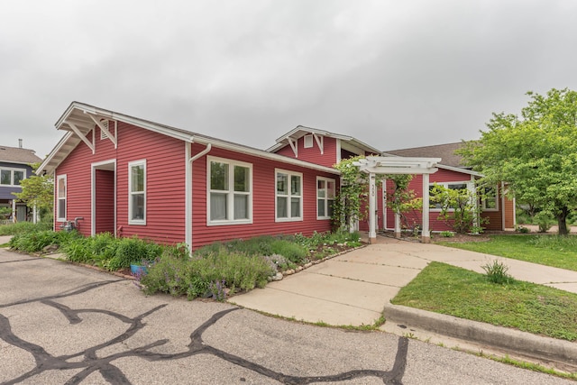 500 Little Lake Dr # 1, Ann Arbor, MI 48103 - view of front of home with a pergola