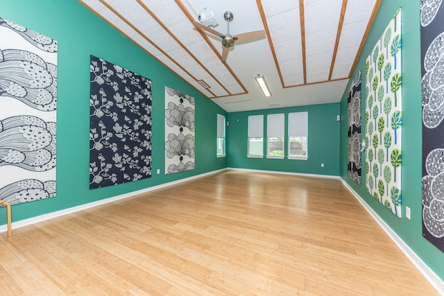 500 Little Lake Dr # 1, Ann Arbor, MI 48103 - empty room with wood finished floors and vaulted ceiling