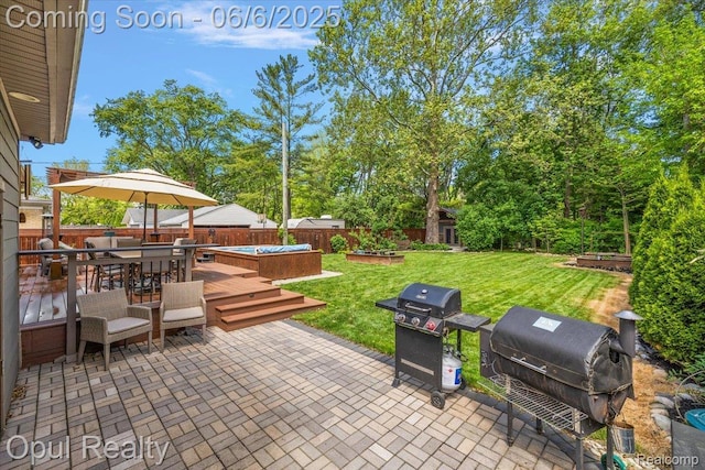 716 Magnolia Ave, Royal Oak, MI 48073 - view of patio / terrace featuring grilling area, outdoor dining area, a deck, a hot tub, and an outdoor structure