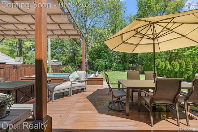 716 Magnolia Ave, Royal Oak, MI 48073 - wooden deck with outdoor dining area, a pergola, a fenced backyard, and view of scattered trees