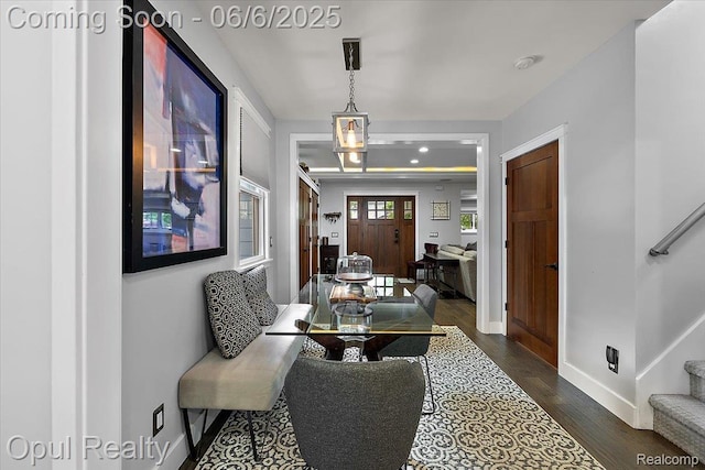 716 Magnolia Ave, Royal Oak, MI 48073 - foyer entrance featuring dark wood-style floors, baseboards, and stairway