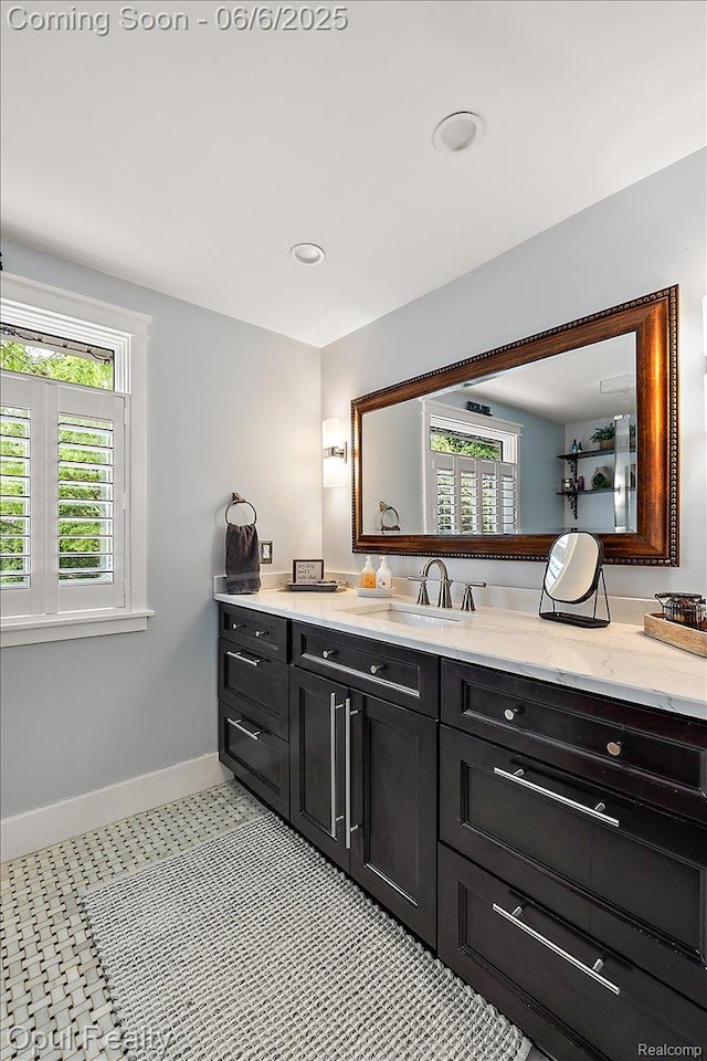 716 Magnolia Ave, Royal Oak, MI 48073 - bathroom with baseboards, vanity, and recessed lighting