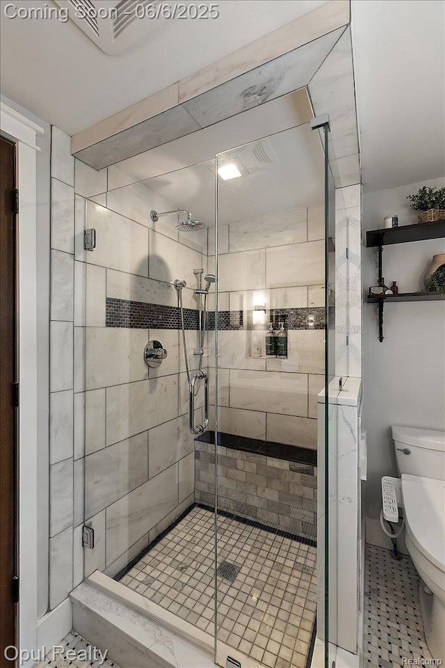 716 Magnolia Ave, Royal Oak, MI 48073 - bathroom with toilet, a stall shower, washer / clothes dryer, and tile patterned floors