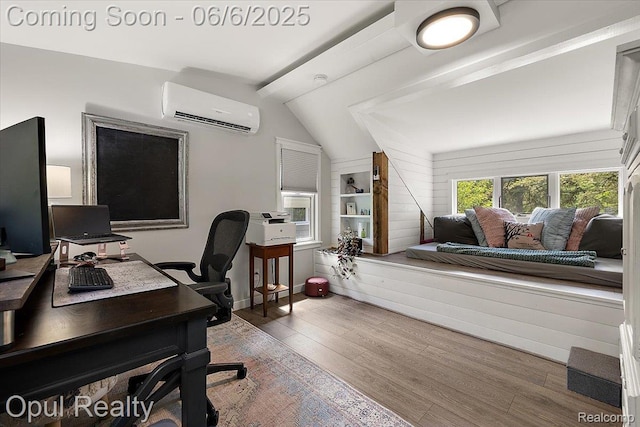 716 Magnolia Ave, Royal Oak, MI 48073 - office area with a wall mounted air conditioner, vaulted ceiling, wood finished floors, baseboards, and built in shelves