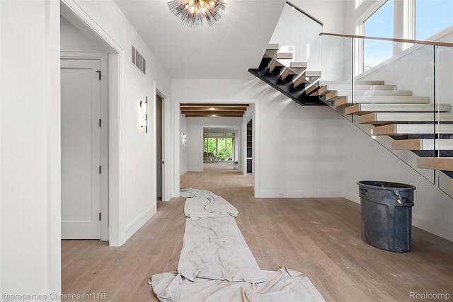 1230 Latham St, Birmingham, MI 48009 - entrance foyer with light wood finished floors and stairway