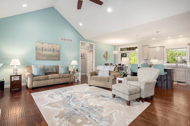 33515 28th Ave, Paw Paw, MI 49079 - living area featuring a ceiling fan, dark wood-style flooring, high vaulted ceiling, recessed lighting, and baseboards