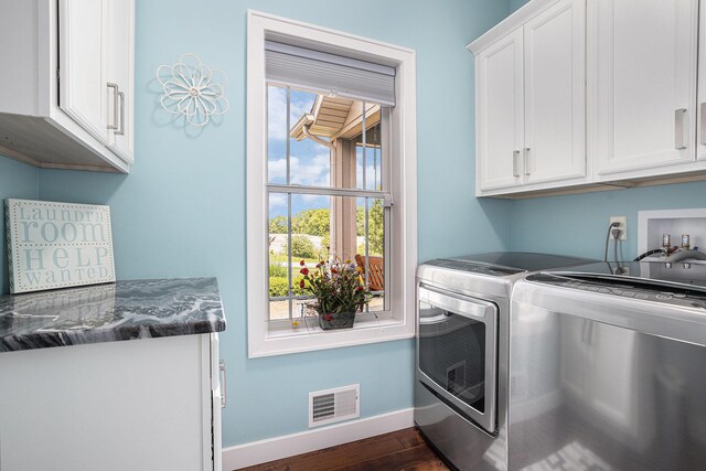33515 28th Ave, Paw Paw, MI 49079 - laundry room featuring cabinet space, independent washer and dryer, baseboards, and dark wood-style floors