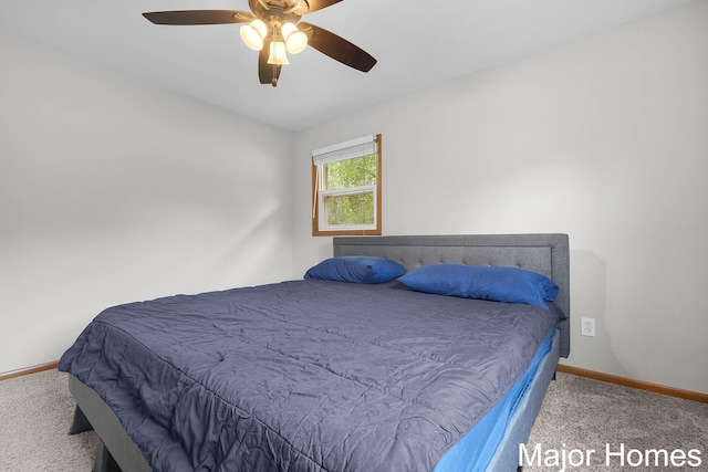 1724 Sandra St NW, Grand Rapids, MI 49544 - carpeted bedroom with baseboards and a ceiling fan