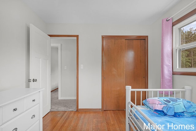 1724 Sandra St NW, Grand Rapids, MI 49544 - bedroom featuring light wood-style floors and baseboards