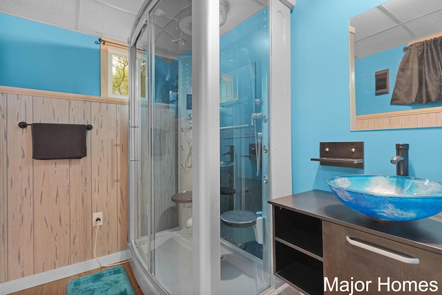 1724 Sandra St NW, Grand Rapids, MI 49544 - full bathroom with a stall shower, toilet, and vanity
