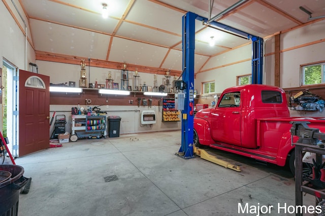 1724 Sandra St NW, Grand Rapids, MI 49544 - garage with a workshop area and heating unit