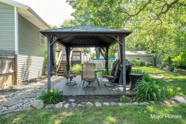 1724 Sandra St NW, Grand Rapids, MI 49544 - wooden deck featuring a gazebo and stairs