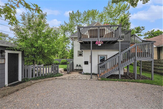 2335 Niles Ave, Saint Joseph, MI 49085 - back of house with stairs and a wooden deck