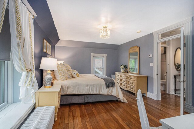 2335 Niles Ave, Saint Joseph, MI 49085 - bedroom with wood finished floors, a chandelier, and baseboards