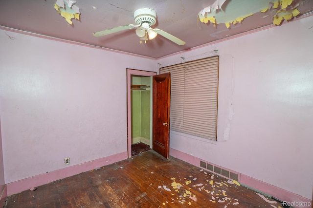 12151 Corbett St, Detroit, MI 48213 - spare room with wood-type flooring and ceiling fan