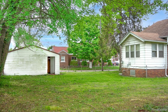 12151 Corbett St, Detroit, MI 48213 - view of yard with an outdoor structure