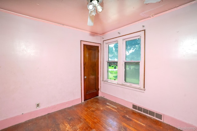 12151 Corbett St, Detroit, MI 48213 - empty room featuring wood finished floors, ceiling fan, and crown molding
