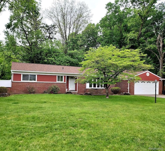 24781 Larkins St, Southfield, MI 48033 - ranch-style home with a front lawn, brick siding, an outbuilding, and entry steps