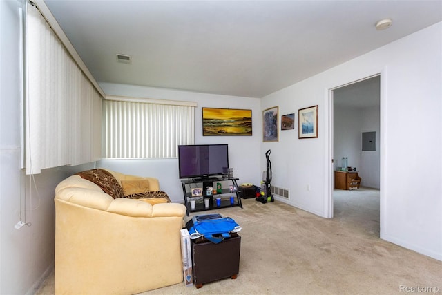 28399 Felician St, Roseville, MI 48066 - living area featuring carpet, baseboards, and electric panel