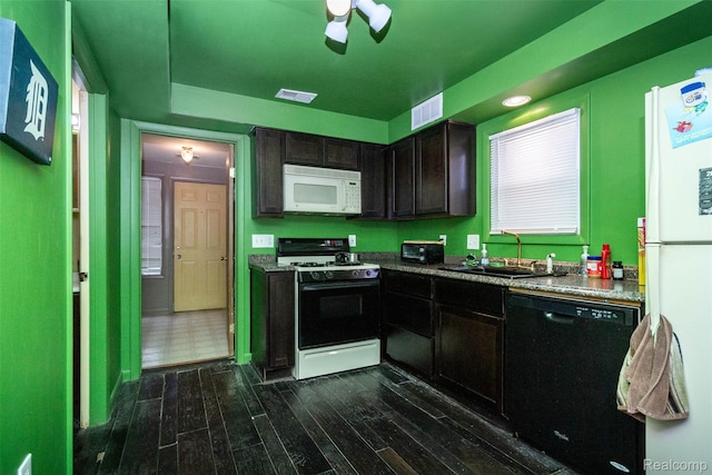 28399 Felician St, Roseville, MI 48066 - kitchen with white appliances, a sink, dark wood-style flooring, dark brown cabinets, and a ceiling fan