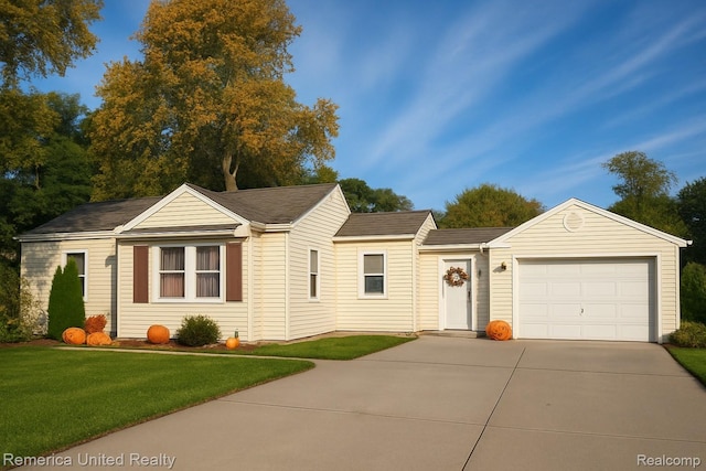 9044 N Sheldon Rd, Plymouth, MI 48170 - single story home featuring concrete driveway, an attached garage, and a front yard